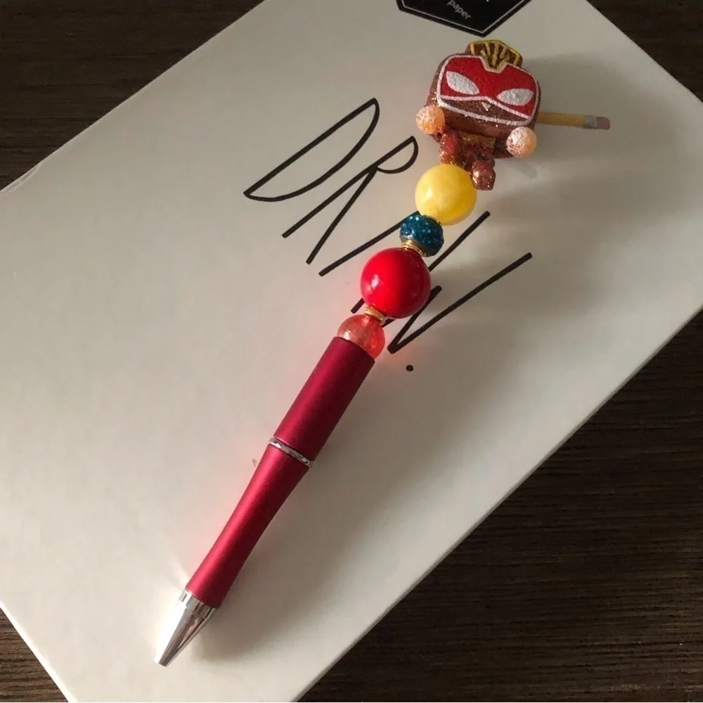 Marvel Gingerbread man handmade beaded pen: Ms. Marvel Glitter